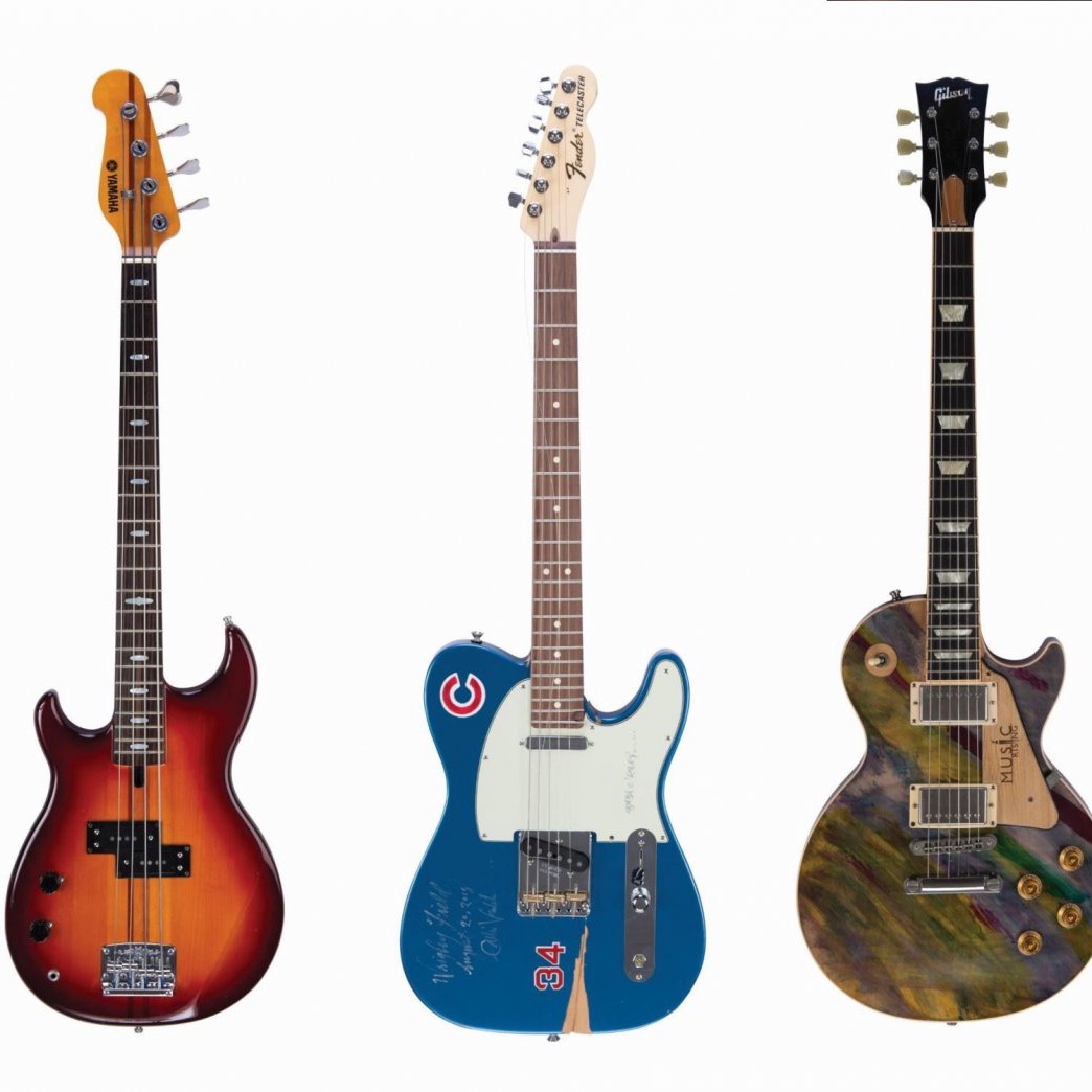 Music rising auction guitars 2000x1500 1392x1044